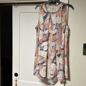 UMGEE women’s sleeveless floral crepe keyhole pleated tent dress.